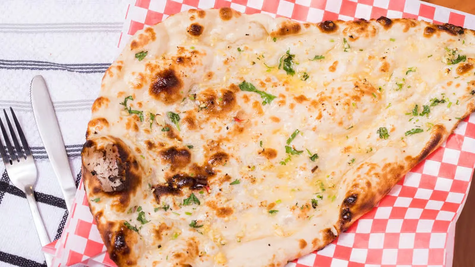 Garlic naan and cheese naan at Shahi Flames - fresh baked tandoor bread Winnipeg